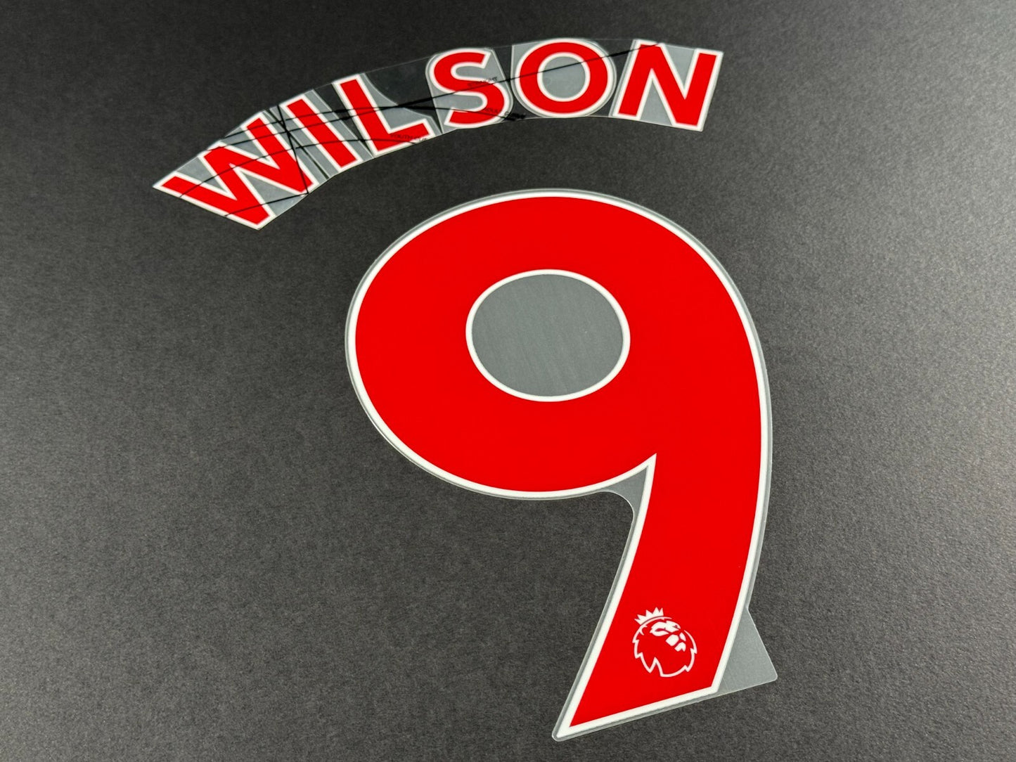 NEWCASTLE 2022-23 WILSON 9 OFFICIAL AVERY DENNISON RED PLAYER SIZE NAME SET
