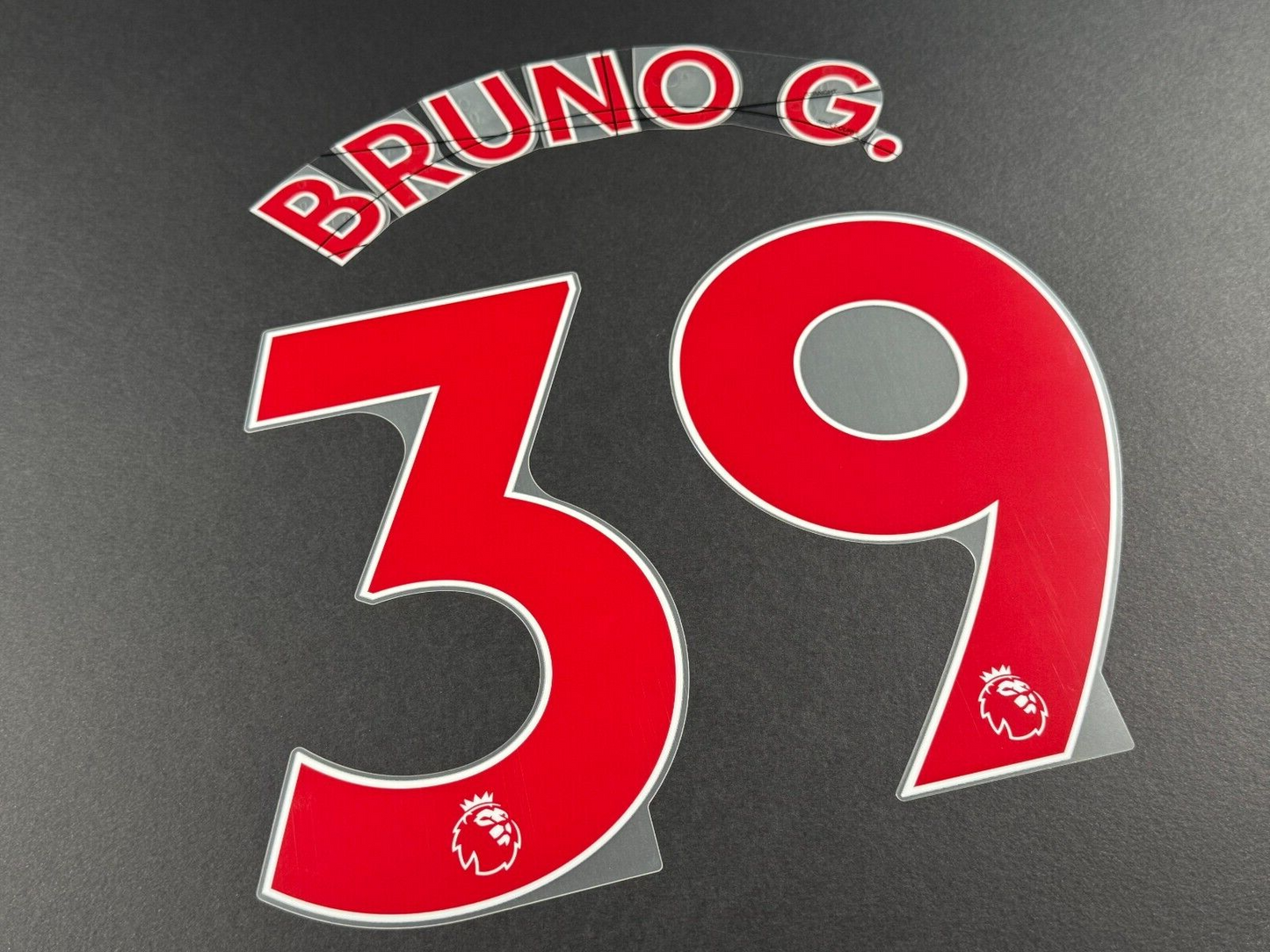 NEWCASTLE 2022-23 BRUNO G. 39 OFFICIAL AVERY DENNISON RED PLAYER SIZE NAME SET