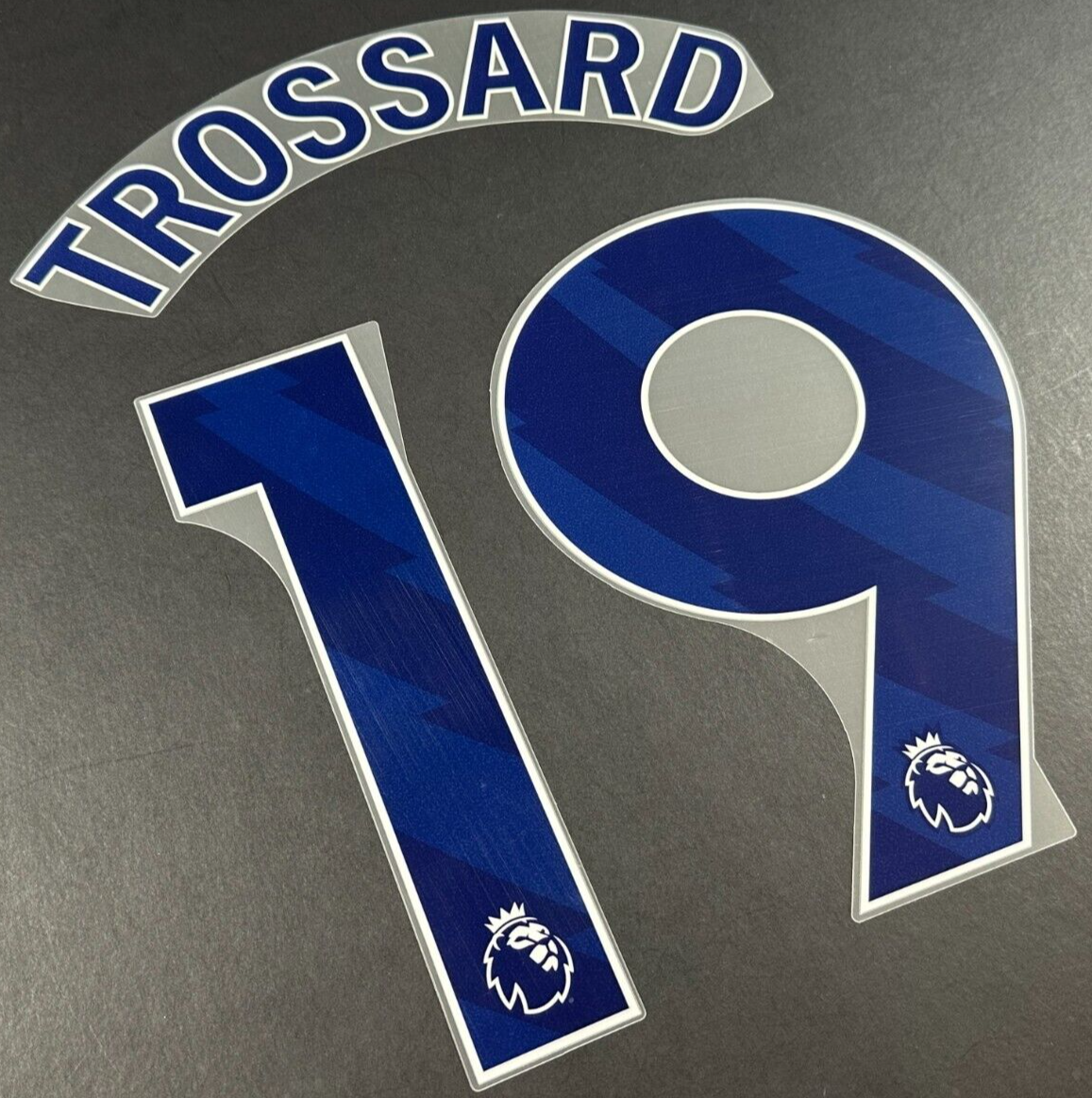 ARSENAL 2023-25 TROSSARD 19 OFFICIAL AVERY DENNISON BLUE PLAYER SIZE NAME SET