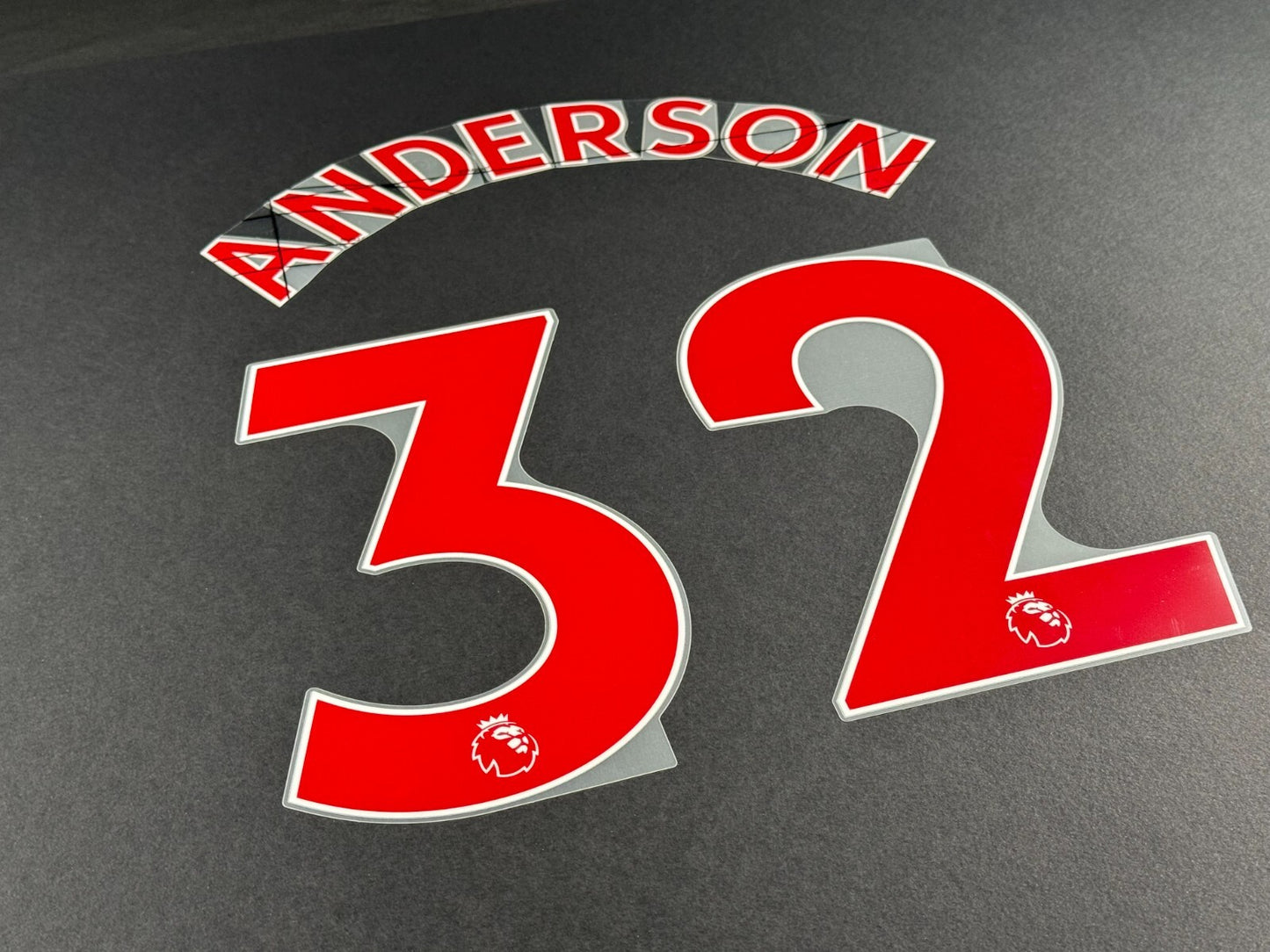 NEWCASTLE 2022-23 ANDERSON 32 OFFICIAL AVERY DENNISON RED PLAYER SIZE NAME SET