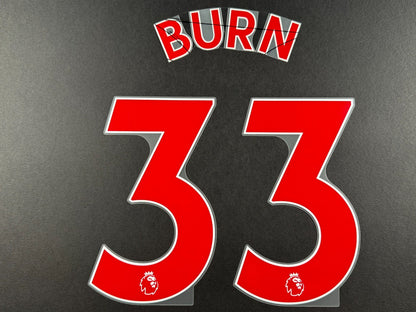 NEWCASTLE 2022-23 BURN 33 OFFICIAL AVERY DENNISON RED PLAYER SIZE NAME SET