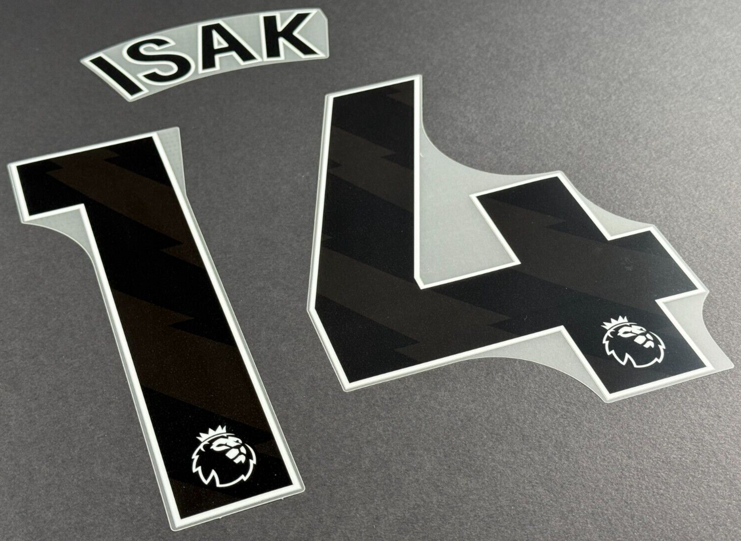 NEWCASTLE UNITED 24-25 ISAK 14 OFFICIAL AVERY DENNISON BLACK PLAYER SIZE SET
