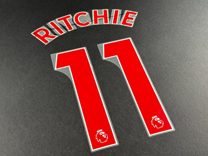 NEWCASTLE 2022-23 RITCHIE 11 OFFICIAL AVERY DENNISON RED PLAYER SIZE NAME SET