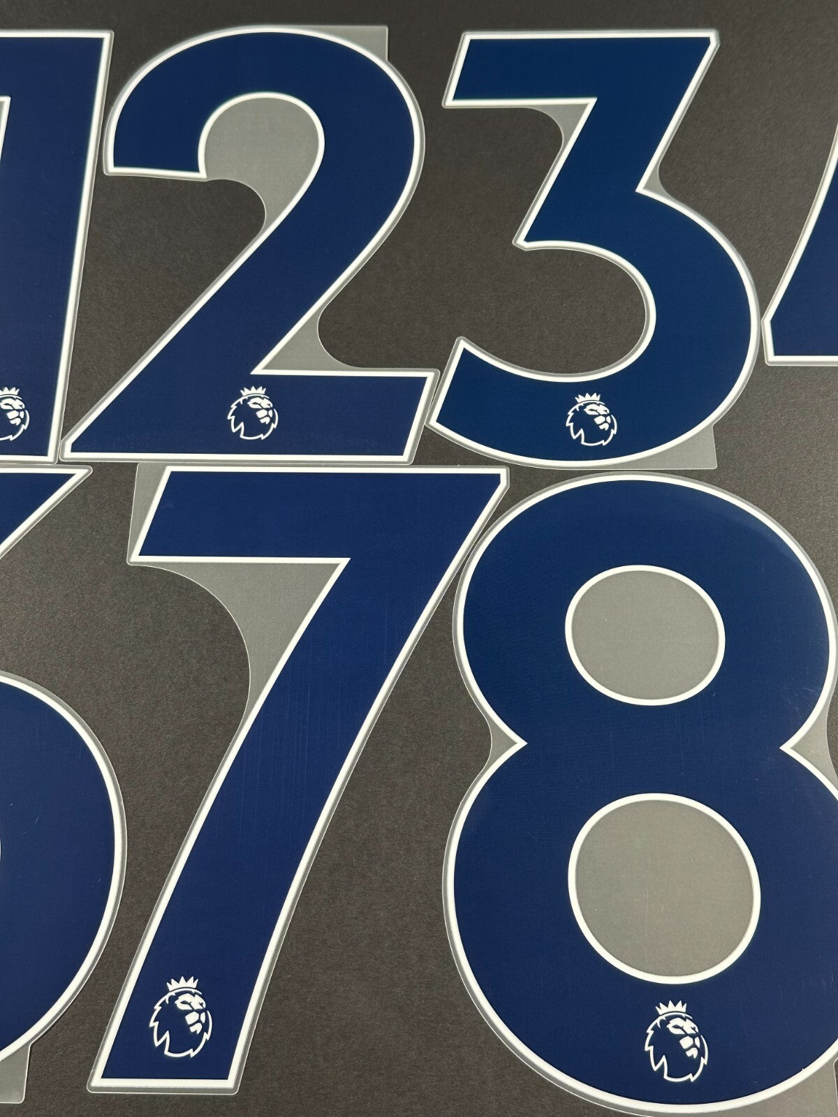 2019 - 2023 OFFICIAL AVERY DENNISON PREMIER LEAGUE BLUE PLAYER SIZE NUMBERS