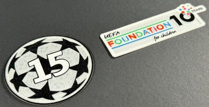 25 / 26 REAL MADRID 15 X  SLEEVE PATCH + 10 YEARS UEFA FOUNDATION PATCH OFFICIAL