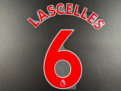 NEWCASTLE 2022-23 LASCELLES 6 OFFICIAL AVERY DENNISON RED PLAYER SIZE NAME SET