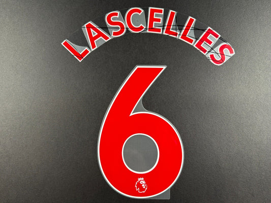 NEWCASTLE 2022-23 LASCELLES 6 OFFICIAL AVERY DENNISON RED PLAYER SIZE NAME SET