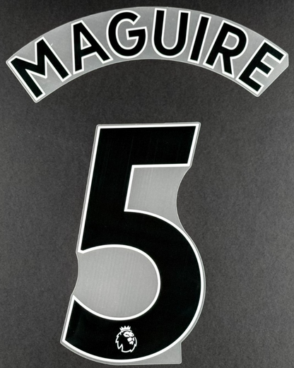 MAN UTD 1923/2023 MAGUIRE 5 OFFICIAL AVERY DENNISON BLACK PLAYER SIZE NAME SET