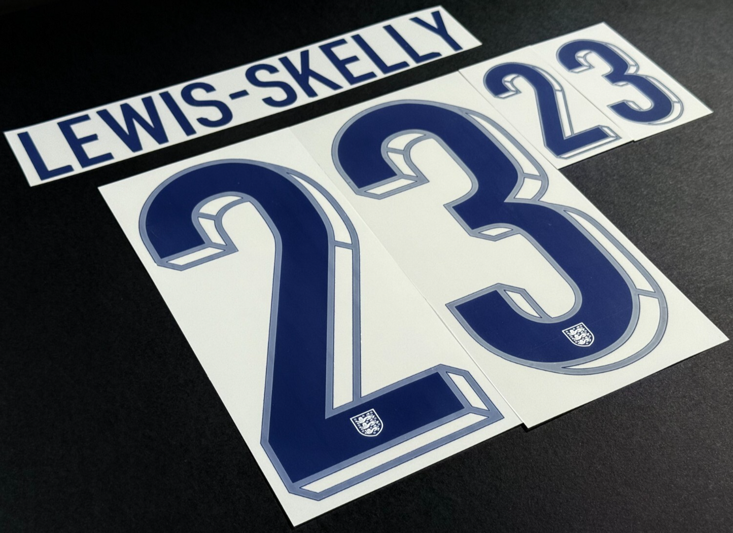 ENGLAND 2024-2025 OFFICIAL SPORTING ID LEWIS - SKELLY 23 HOME PLAYER NAME SET