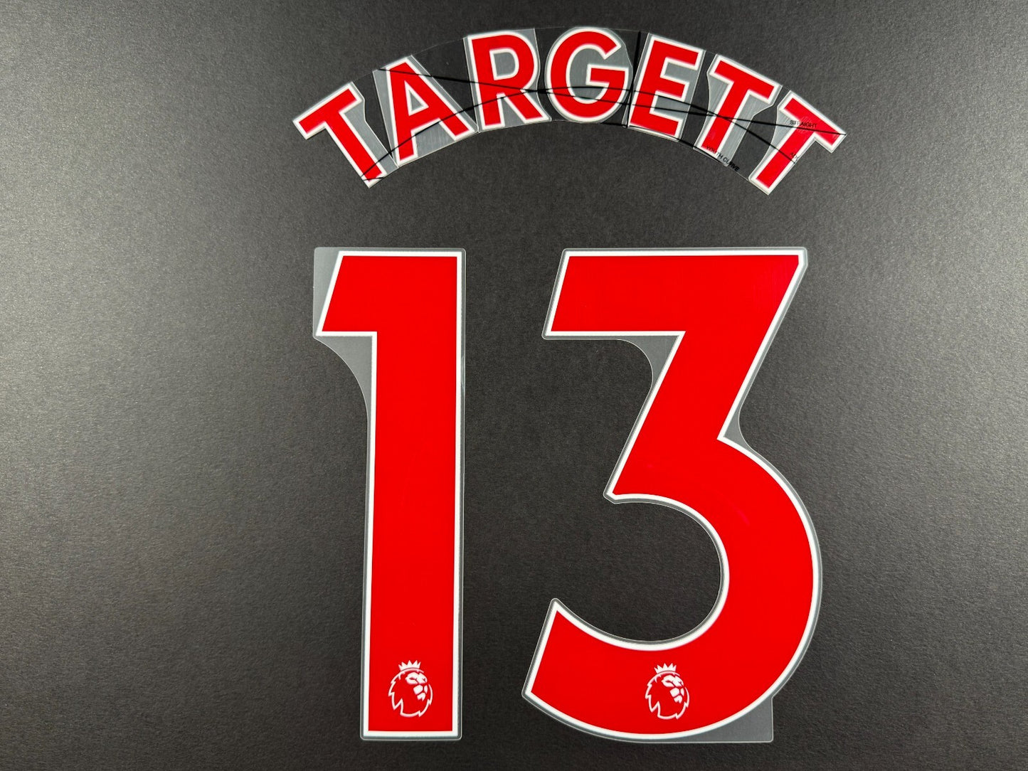 NEWCASTLE 2022-23 TARGETT 13 OFFICIAL AVERY DENNISON RED PLAYER SIZE NAME SET