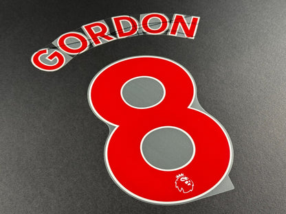 NEWCASTLE 2022-23 GORDON 8 OFFICIAL AVERY DENNISON RED PLAYER SIZE NAME SET