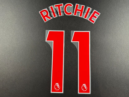 NEWCASTLE 2022-23 RITCHIE 11 OFFICIAL AVERY DENNISON RED PLAYER SIZE NAME SET