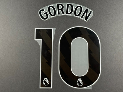 NEWCASTLE 2024 2025 GORDON 10 OFFICIAL AVERY DENNISON BLACK PLAYER SIZE NAME SET