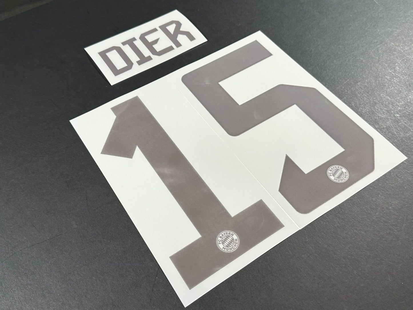 2024 2025 OFFICIAL BAYERN MUNICH DIER 15 HOME DARK RED PLAYER SIZE NAMESET