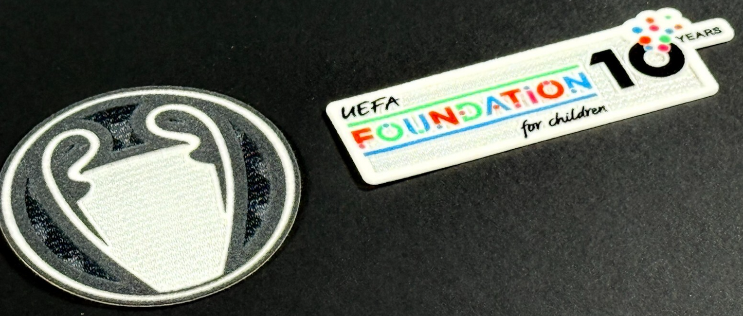 25 / 26 UEL TITLEHOLDER  SLEEVE PATCH + 10 YEARS UEFA FOUNDATION PATCH OFFICIAL