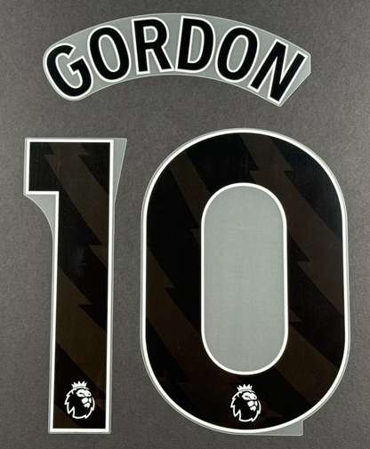 NEWCASTLE 2025 2026 GORDON 10 OFFICIAL AVERY DENNISON BLACK PLAYER SIZE NAME SET