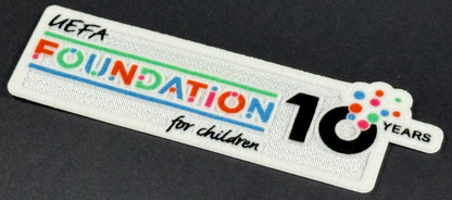 25 / 26 REAL MADRID 15 X  SLEEVE PATCH + 10 YEARS UEFA FOUNDATION PATCH OFFICIAL