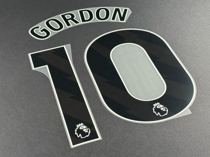 NEWCASTLE 2023 2024 GORDON 10 OFFICIAL AVERY DENNISON BLACK PLAYER SIZE NAME SET