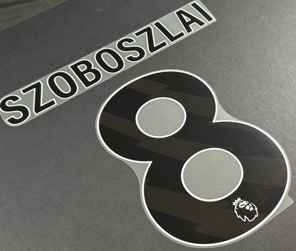 2023 - 2025 SZOBOSZLAI 8 OFFICIAL AVERY DENNISON BLACK PLAYER SIZE NAME SET