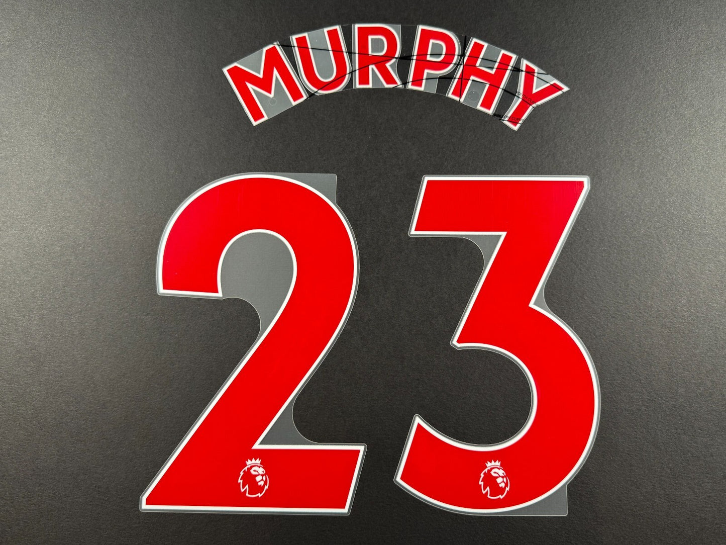 NEWCASTLE 2022-23 MURPHY 23 OFFICIAL AVERY DENNISON RED PLAYER SIZE NAME SET