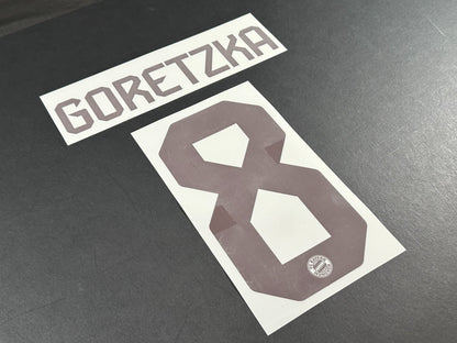 2024 2025 OFFICIAL BAYERN MUNICH GORETZKA 8 HOME DARK RED PLAYER SIZE NAMESET