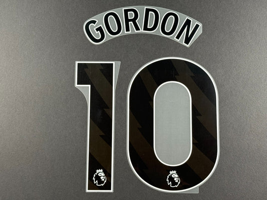 NEWCASTLE 2023 2024 GORDON 10 OFFICIAL AVERY DENNISON BLACK PLAYER SIZE NAME SET