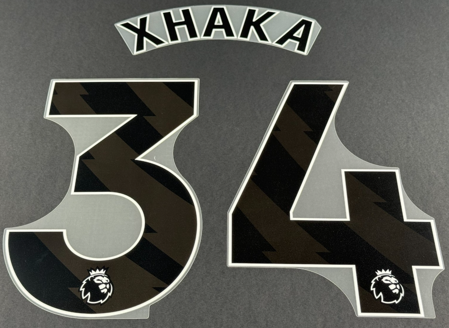 SUNDERLAND 2025-26 XHAKA 34 OFFICIAL AVERY DENNISON BLACK PLAYER SIZE NAME SET