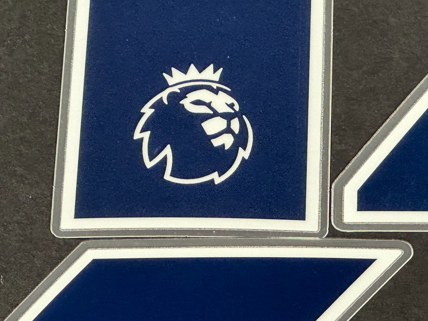 2019 - 2023 OFFICIAL AVERY DENNISON PREMIER LEAGUE BLUE PLAYER SIZE NUMBERS