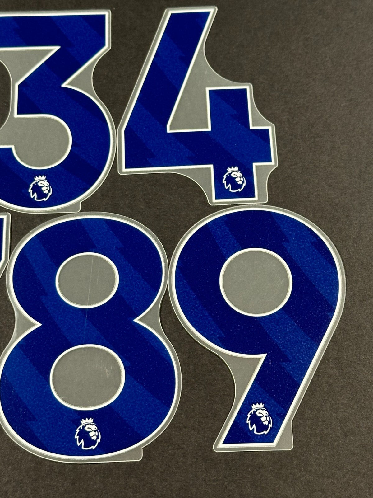 2023 2024 OFFICIAL AVERY DENNISON PREMIER LEAGUE BLUE SHORTS NUMBERS