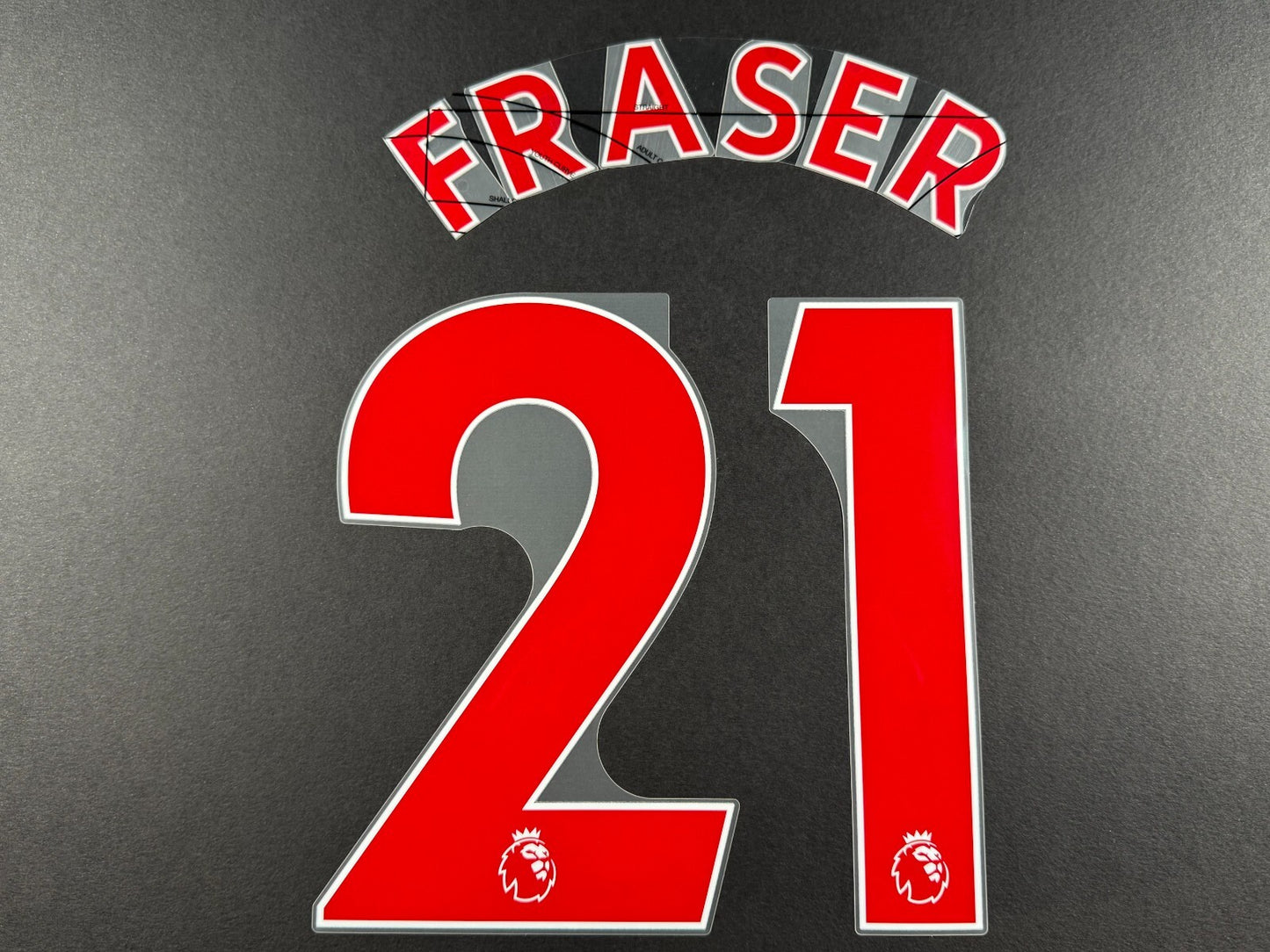 NEWCASTLE 2022-23 FRASER 21 OFFICIAL AVERY DENNISON RED PLAYER SIZE NAME SET