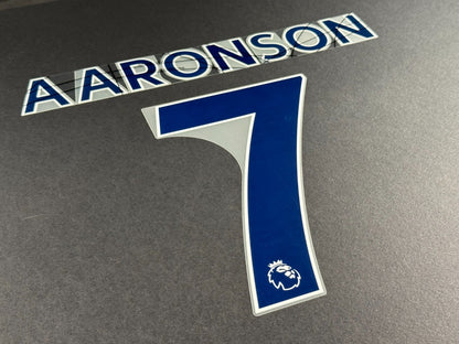 LEEDS UNITED 2022 2023 AARONSON 7 OFFICIAL AVERY BLUE PLAYER SIZE NAME SET