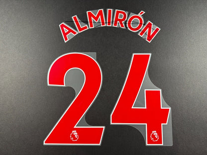 NEWCASTLE 2022-23 ALMIRON 24 OFFICIAL AVERY DENNISON RED PLAYER SIZE NAME SET