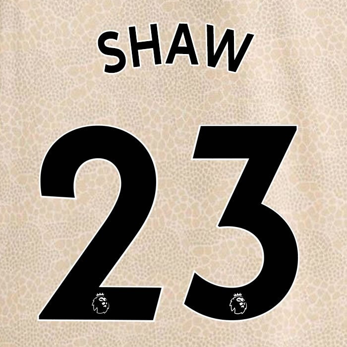 MAN UTD 2019-2023 SHAW 23 OFFICIAL AVERY DENNISON BLACK PLAYER SIZE NAME SET