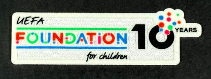 2025 / 2026 SPORTING ID UEFA FOUNDATION 10 YEARS PLAYER SLEEVE PATCH 100MM